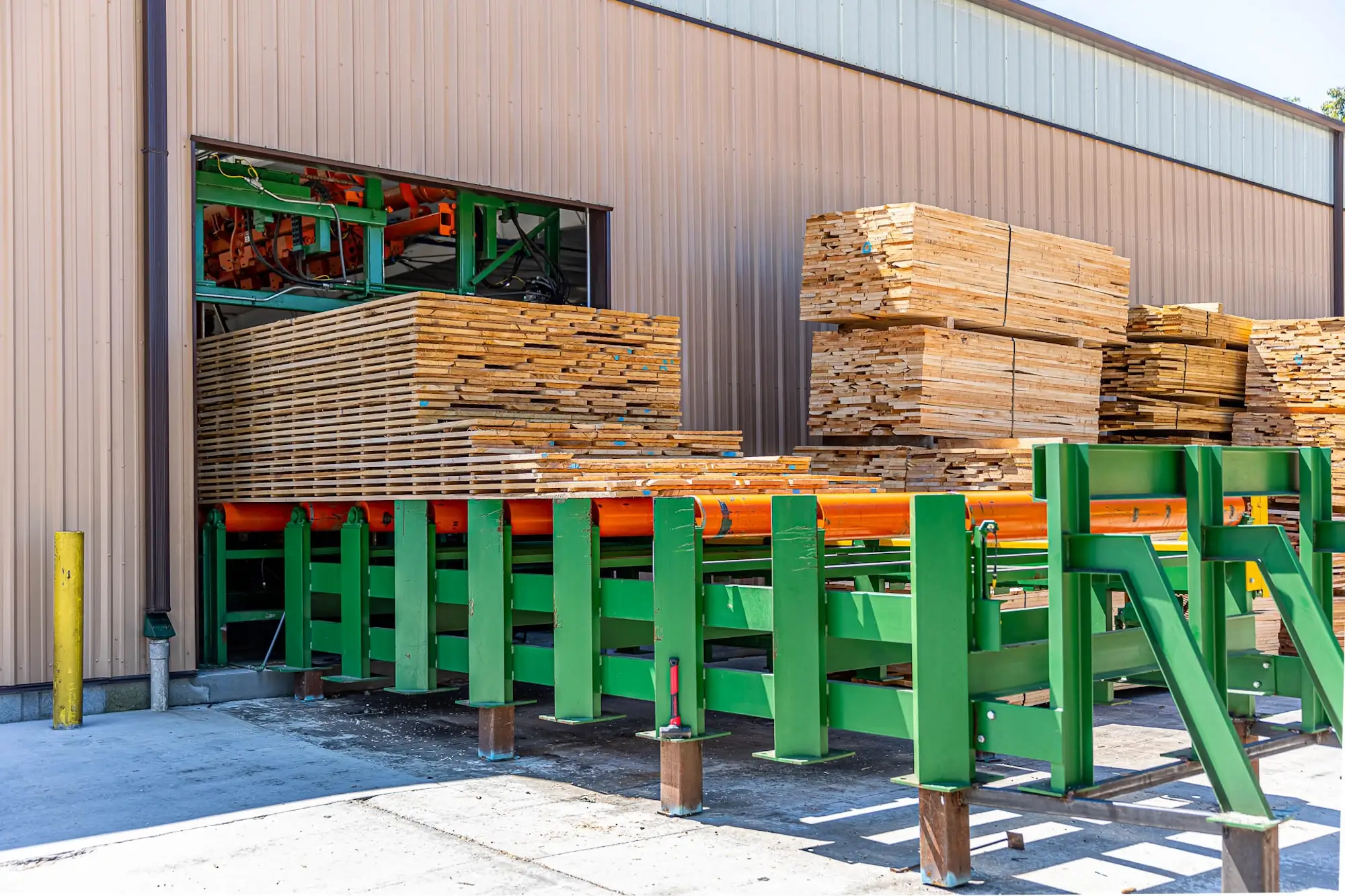 Wood being processed by machines at Stoltzfus Hardwoods.