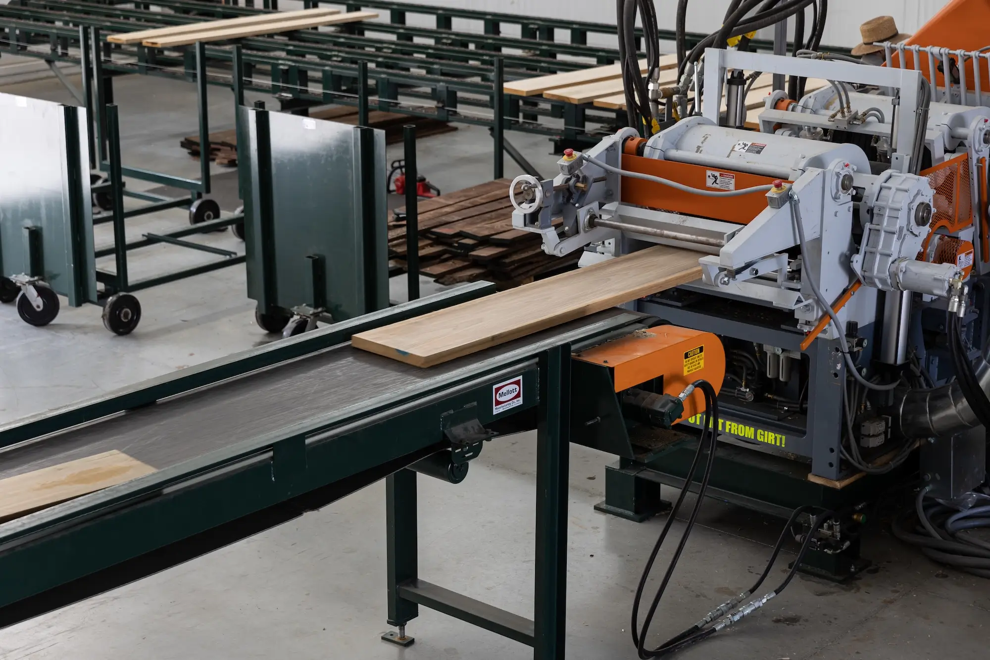 Hardwood being processed by machines at Stoltzfus Hardwoods.