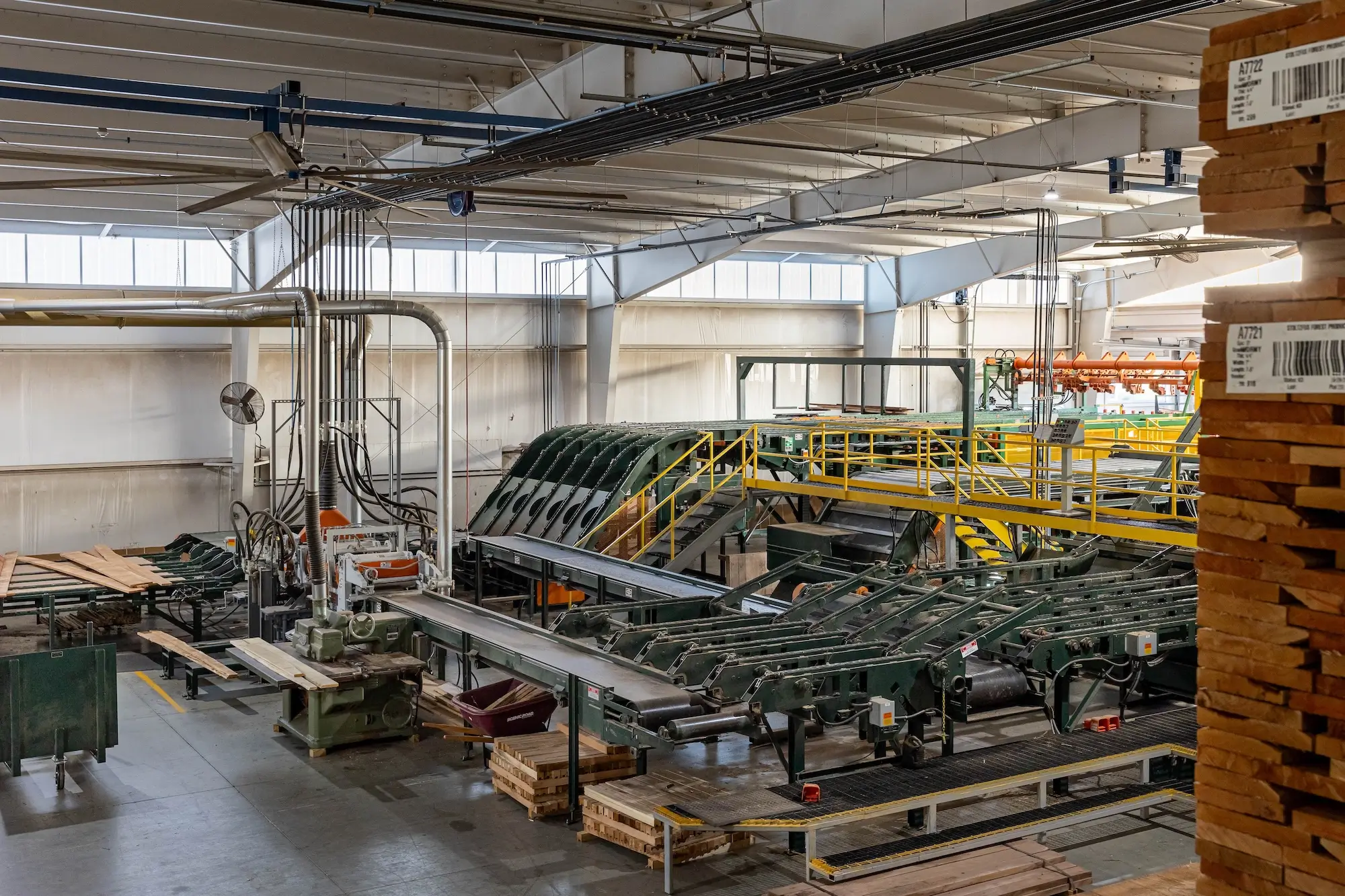 Hardwood being processed by machines at Stoltzfus Hardwoods.